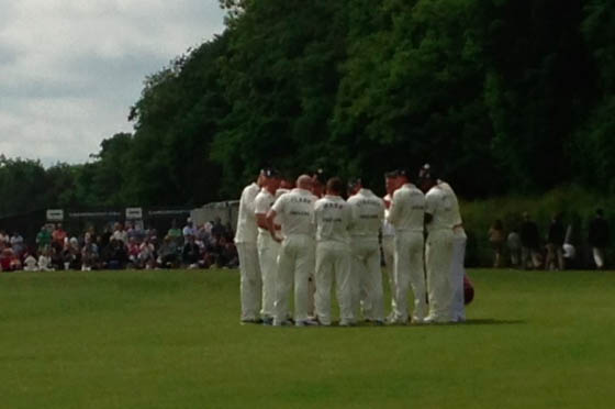 England cricket team in a huddle