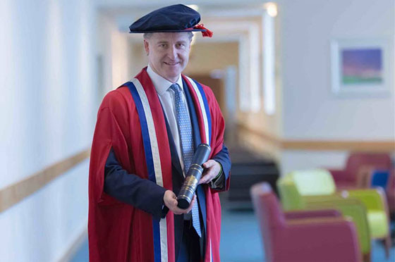 Oli Christie receives Honorary Degree from the University of Gloucestershire